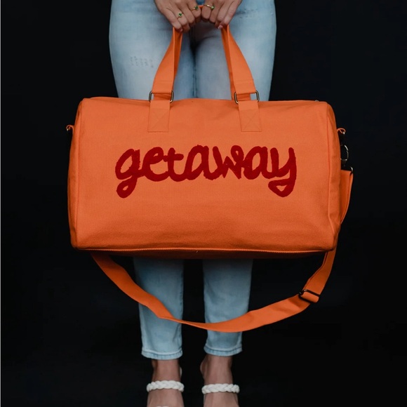 Last one! Attention jet setters! Amazing getaway duffle bag π§‘β€οΈ βοΈ - Picture 2 of 4